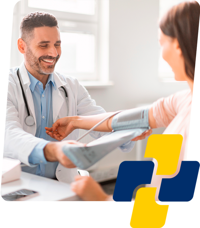 Subjective camera angle of a friendly male doctor in his 50s with glasses and a beard, talking to a female patient in a bright, modern clinic. Warm, natural lighting with subtle yellow and blue highlights, creating a feeling of trust and care. Defocused plant in the foreground.